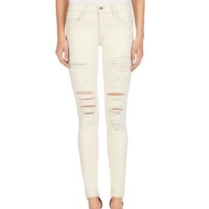 J Brand Distressed Skinny Jeans in Divo